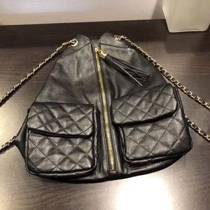 Black faux leather zip up backpack